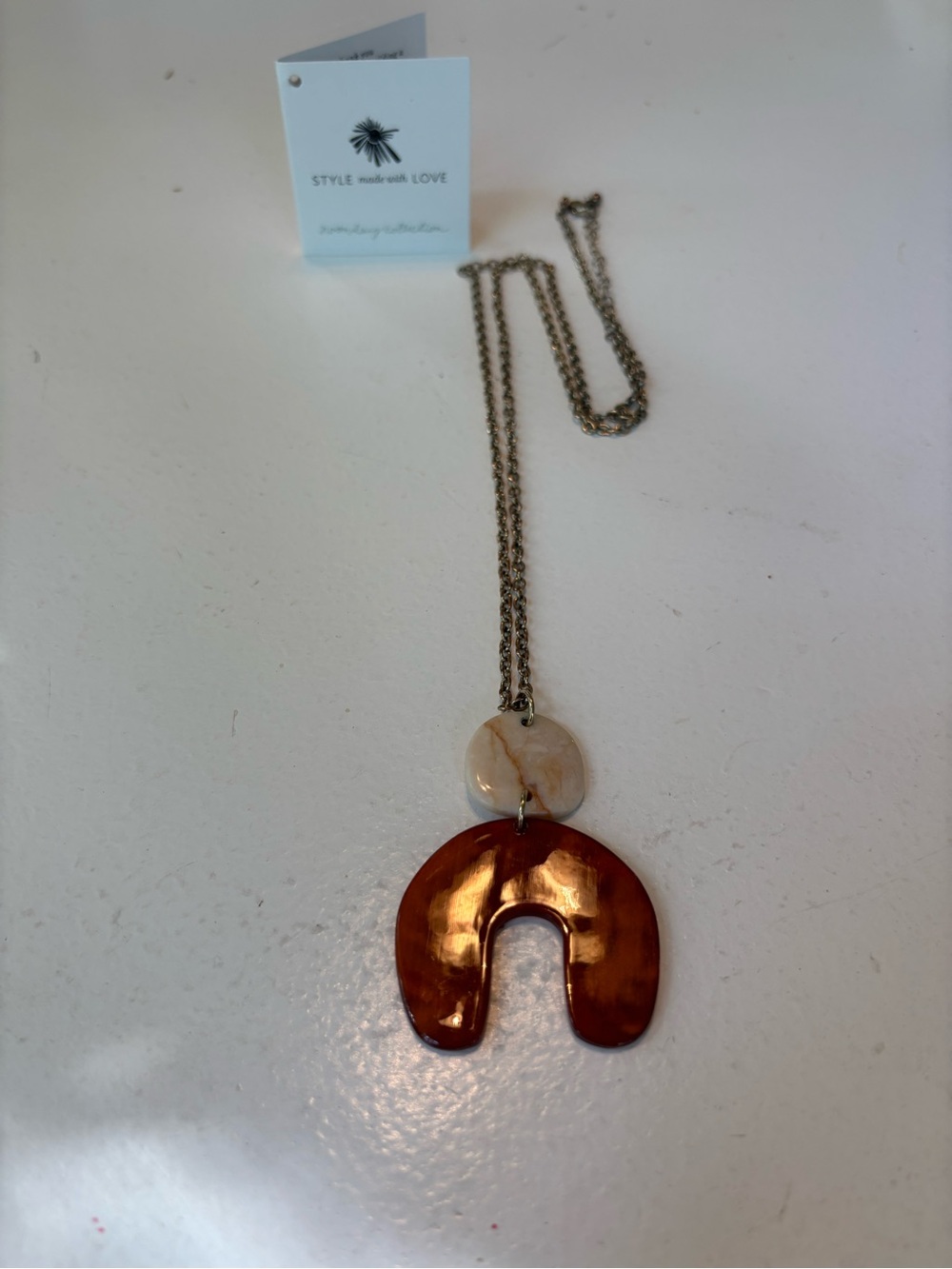 Noonday Collection Copper Brown Arch Pendant Necklace with Cream Accent